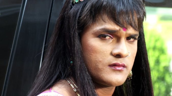 khesari dressed as a female